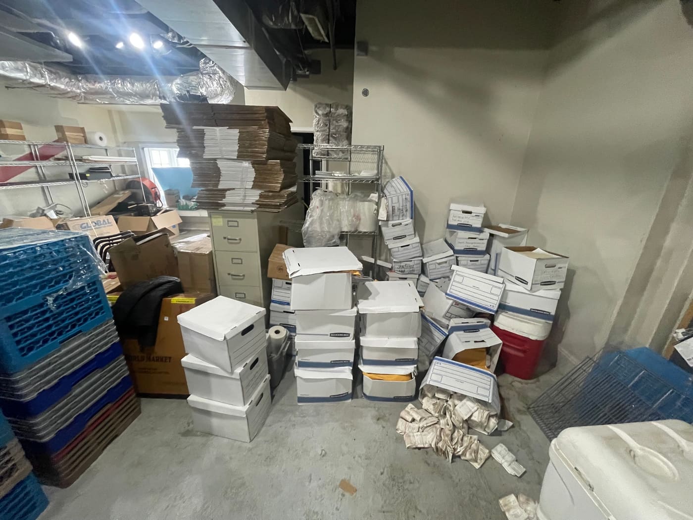 N. Georgia Junk clearing stored records, shelving, and inventory from a commercial back-of-house in Atlanta, GA